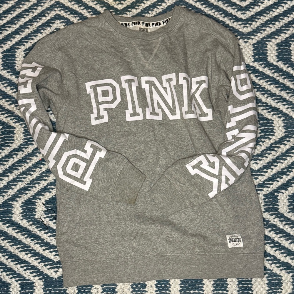 Pink- sweat shirt.